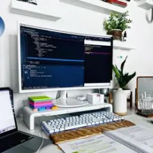 a group od people stading at the base of the wallfall